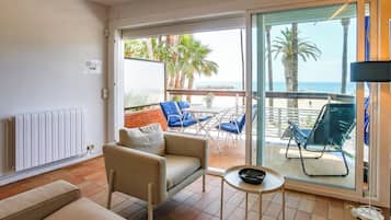 Apartamento, 2 quartos, vista para o oceano | Área de estar