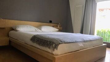 Apartment, 1 Bedroom, Balcony, Garden View | 1 bedroom, iron/ironing board, free WiFi, bed sheets