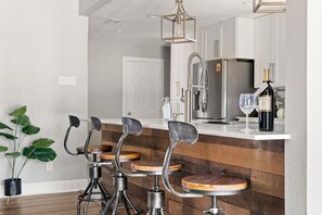 Dining tables, kitchen islands - Sleeps 20 w Heated Pool & Billiards by DAL Airport (Dallas)