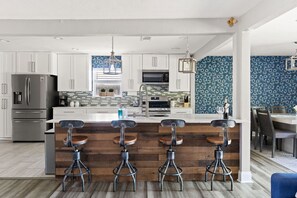 Dining tables, kitchen islands - Sleeps 20 w Heated Pool & Billiards by DAL Airport (Dallas)