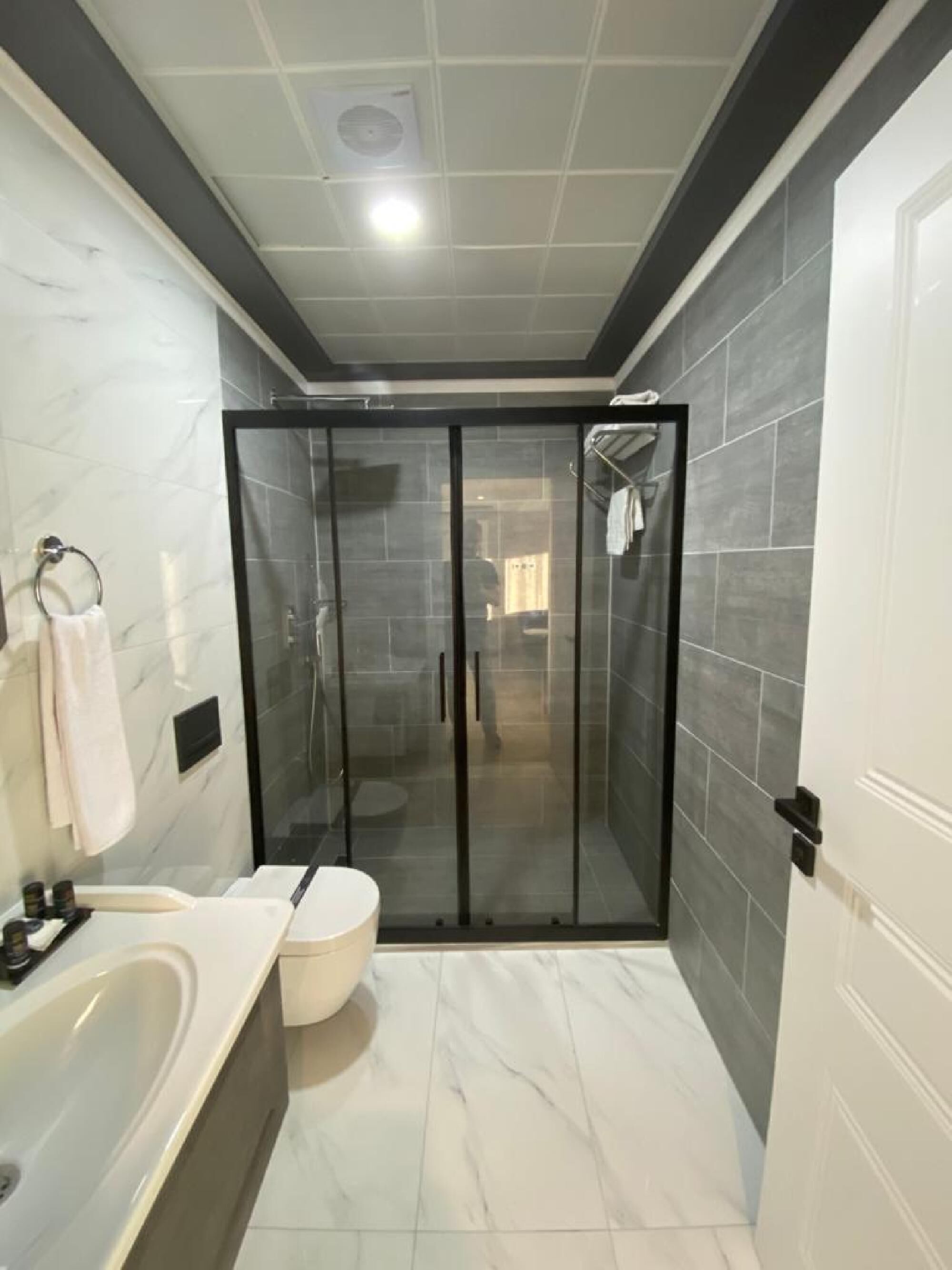 family room | bathroom | shower, free toiletries, hair dryer, slippers