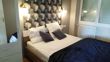 1 chambre, fer et planche Ă repasser, Wi-Fi, draps fournis