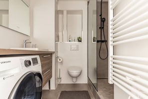 Hair dryer, bathrobes, towels, toilet paper