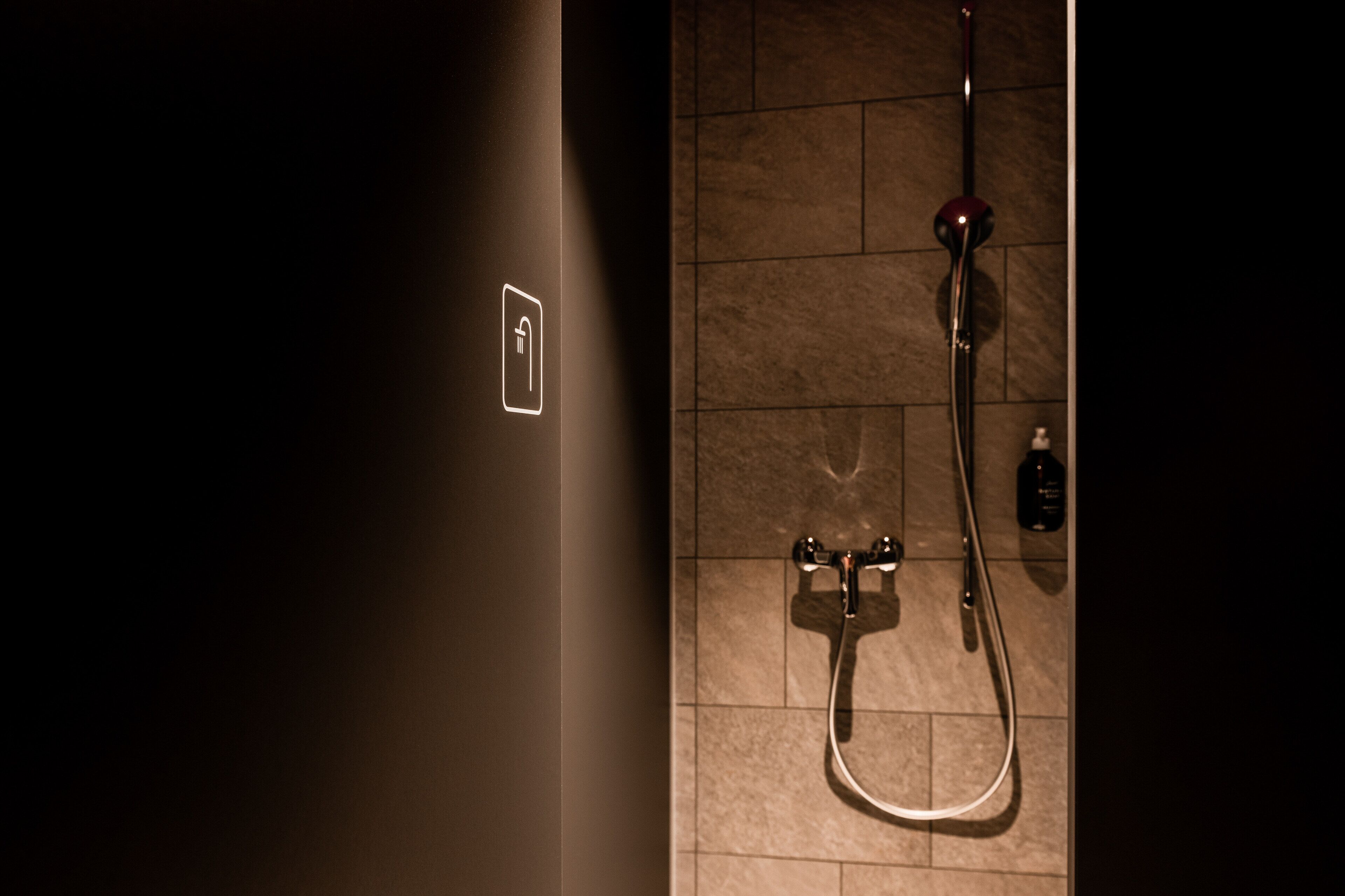 female only - swiss capsule (upper level) | bathroom | shower, hair dryer, towels