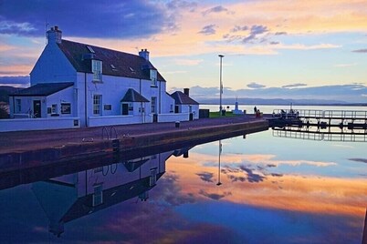 2 Bedroom House  with the Caledonian Canal at rear.