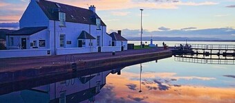 2 Bedroom House with the Caledonian Canal at rear.