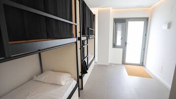 Premium bedding, blackout drapes, free WiFi, bed sheets