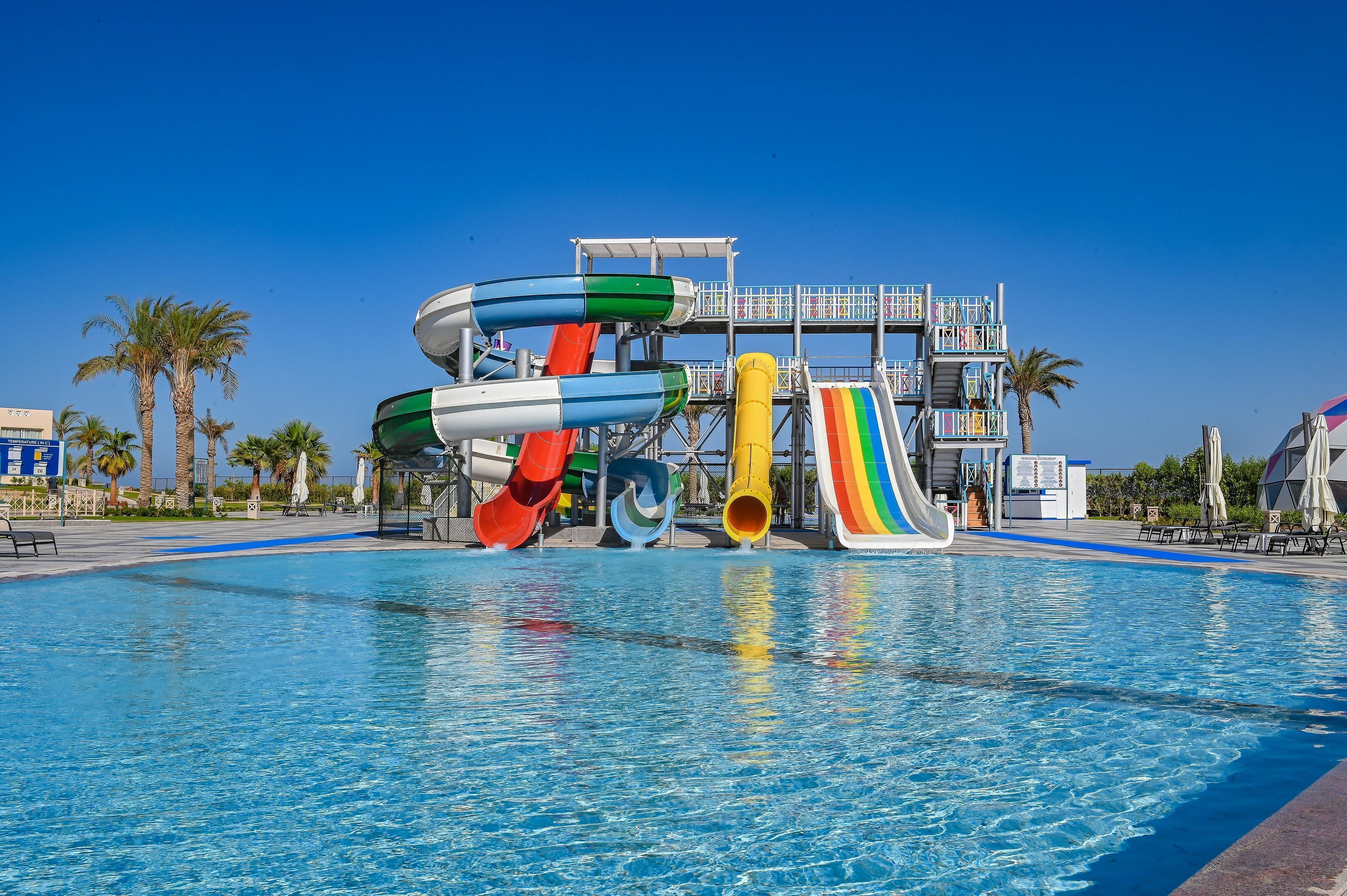 8 outdoor pools, pool umbrellas, pool loungers