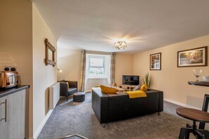 Ferienhaus | Wohnbereich | Flachbildfernseher