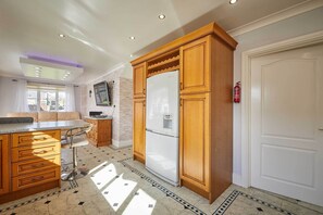 House | Private kitchen | Full-sized fridge, microwave, oven, stovetop
