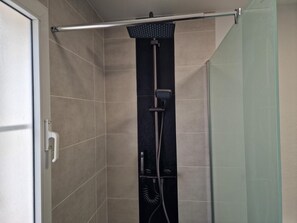 Bathtub, hair dryer, towels