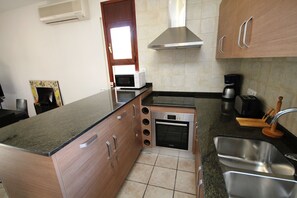 Fridge, microwave, oven, coffee/tea maker