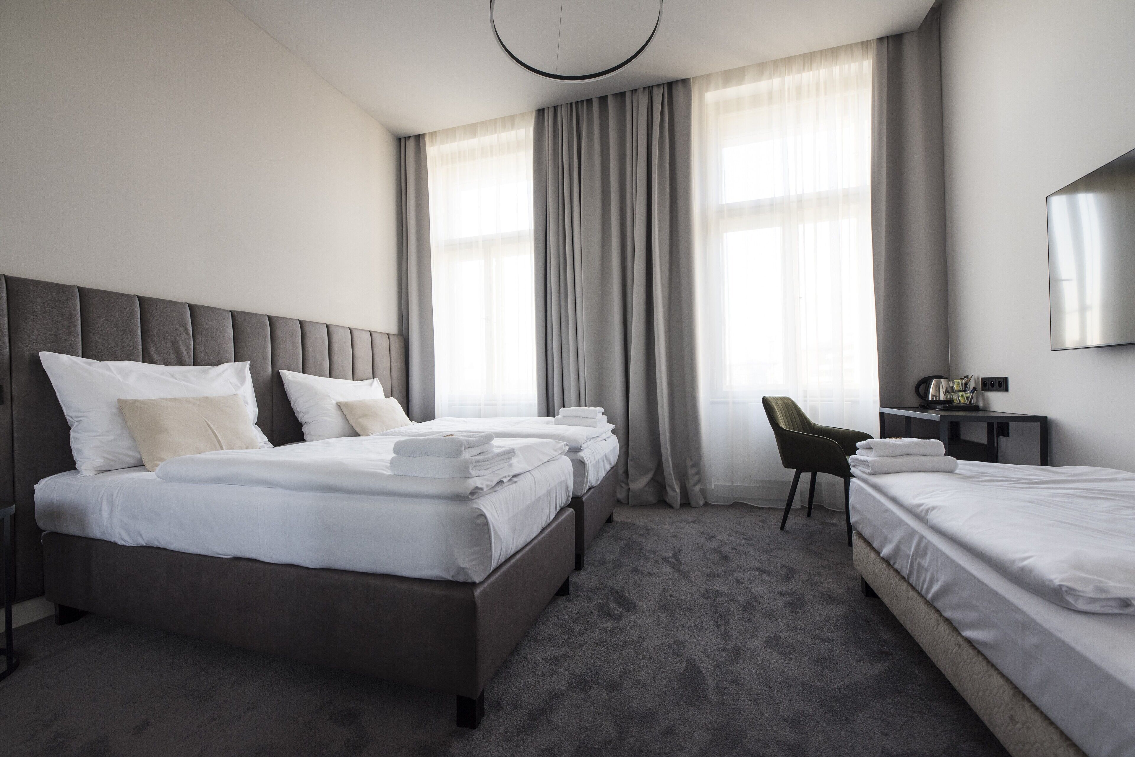 standard triple room | minibar, in-room safe, blackout curtains, iron/ironing board