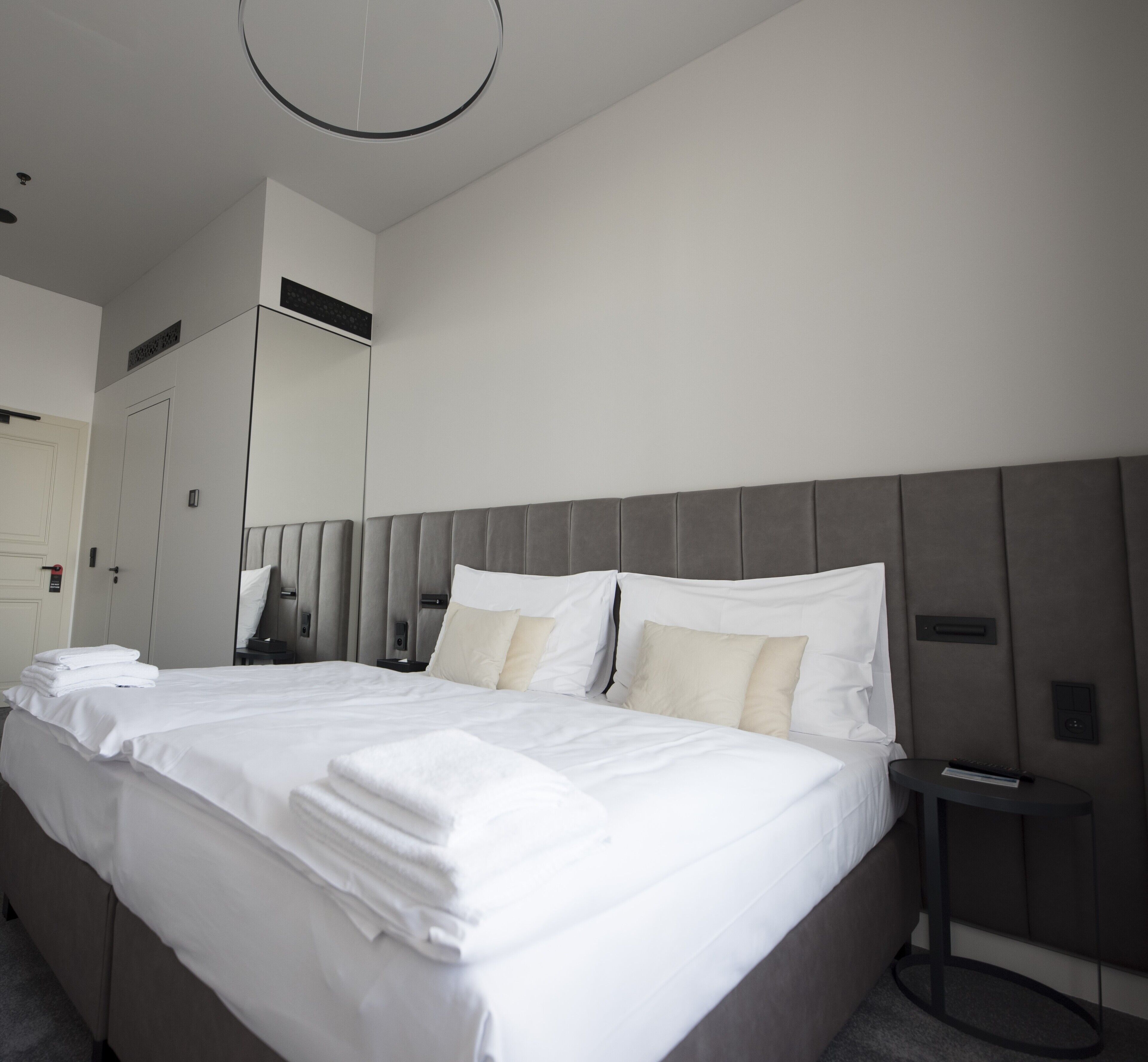 superior double or twin room | minibar, in-room safe, blackout curtains, iron/ironing board