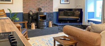 The cottage is so attractive with its traditional thatch and whitewashed walls.