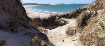 The cottage is so attractive with its traditional thatch and whitewashed walls.