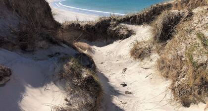 The cottage is so attractive with its traditional thatch and whitewashed walls.