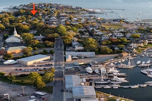 Stunning coastal town with a marina, church, and scenic views.