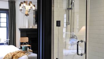 Shower, rainfall showerhead, designer toiletries, hair dryer