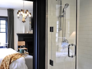 Shower, rainfall showerhead, designer toiletries, hair dryer
