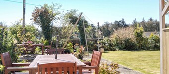 Where better to enjoy the hot tub in this delightful and private garden.