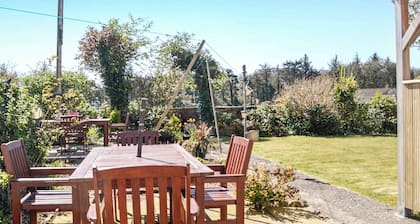 Where better to enjoy the hot tub in this delightful and private garden.