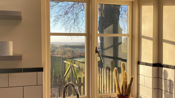 A kitchen with a window, a faucet, and a cactus plant. - Southfield Art Studio (Braunston, near Daventry)