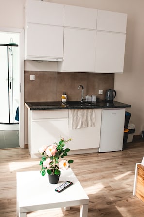 Fridge, stovetop, electric kettle, toaster