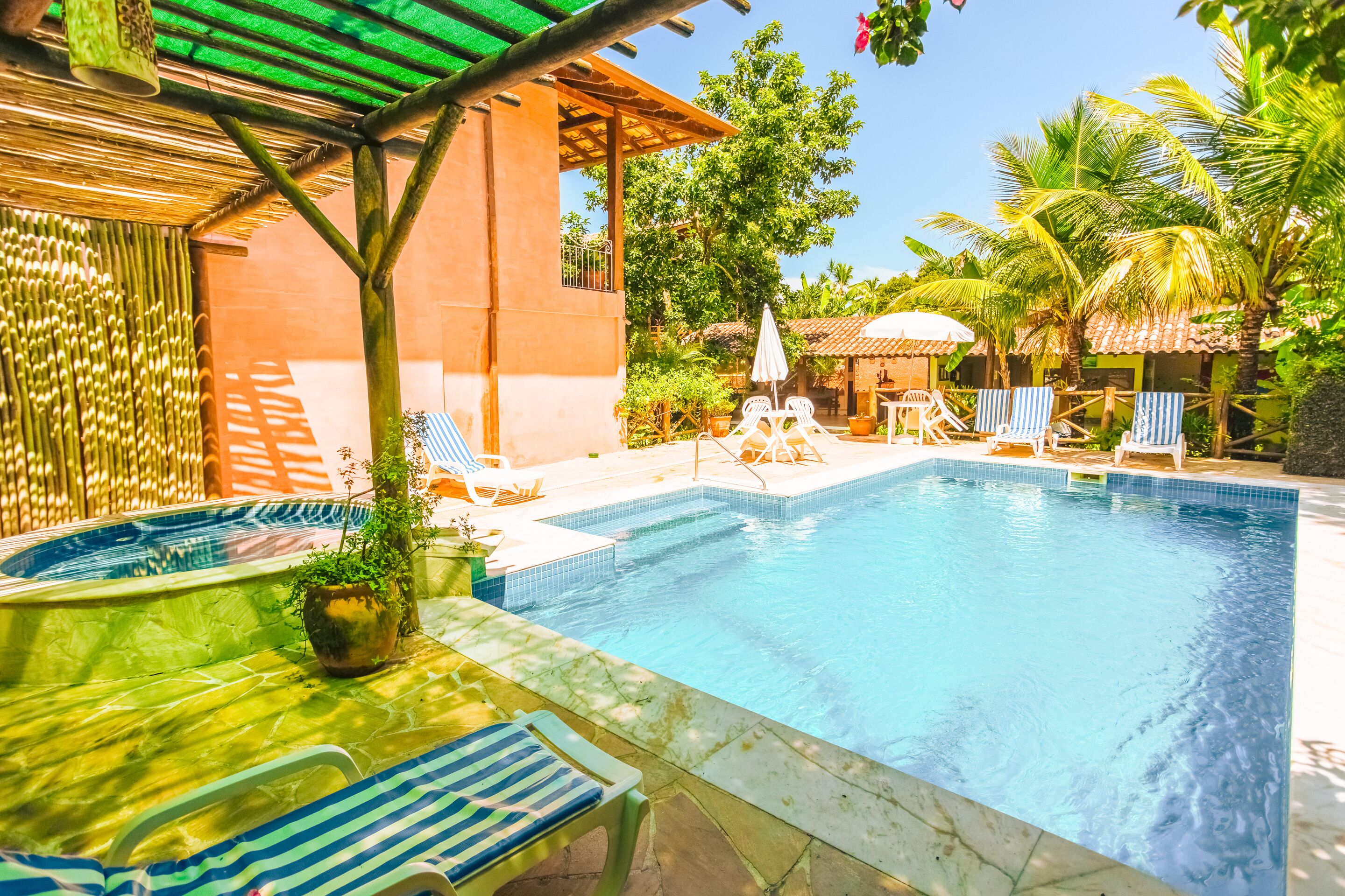 Outdoor pool, pool umbrellas, sun loungers