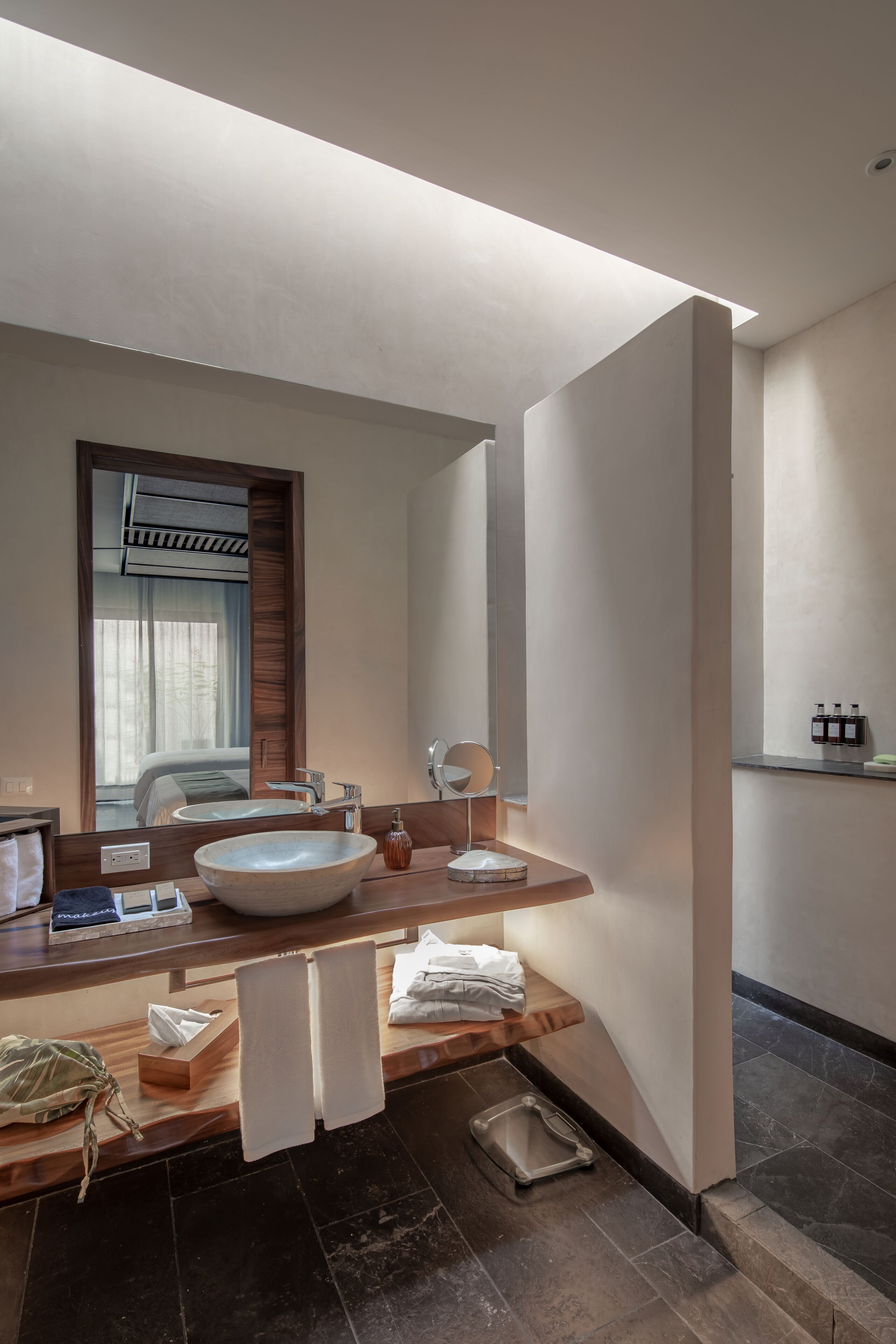 family room | bathroom | shower, rainfall showerhead, eco-friendly toiletries, hair dryer