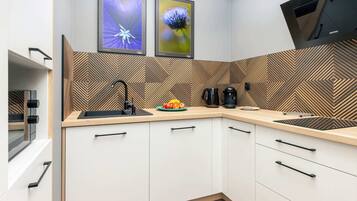 Fridge, microwave, stovetop, coffee/tea maker