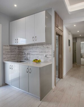 Comfort Studio Suite | Private kitchen | Mini-fridge, microwave, oven, stovetop - Studio penthouse near Acropolis by GHH (Athens)