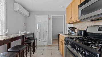 Condo (WW410 East Magnolia Avenue Unit 101) | Private kitchen | Fridge, microwave, stovetop, coffee/tea maker