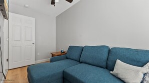 Condo (WW410 East Magnolia Avenue Unit 101) | Living room | TV - Ww410 East Magnolia Avenue Unit 101 (Wildwood)