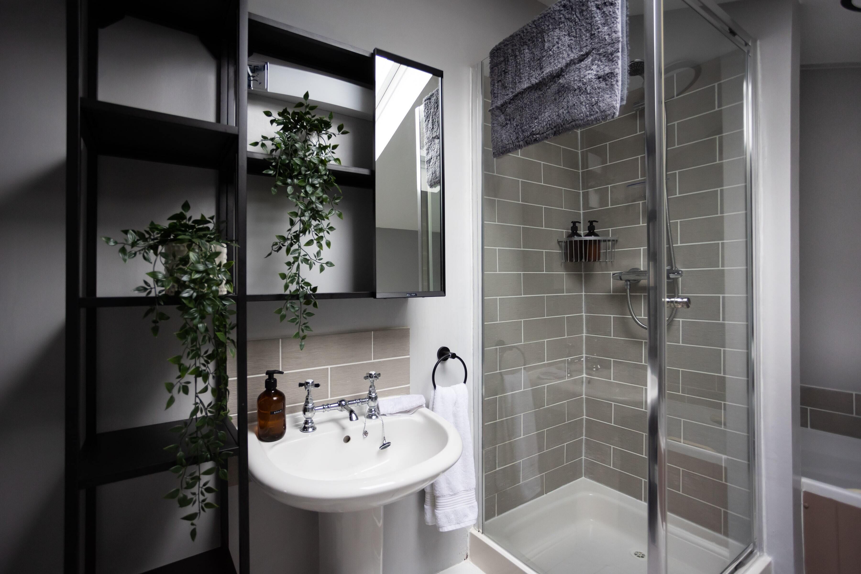 Bathtub, hair dryer, towels, soap