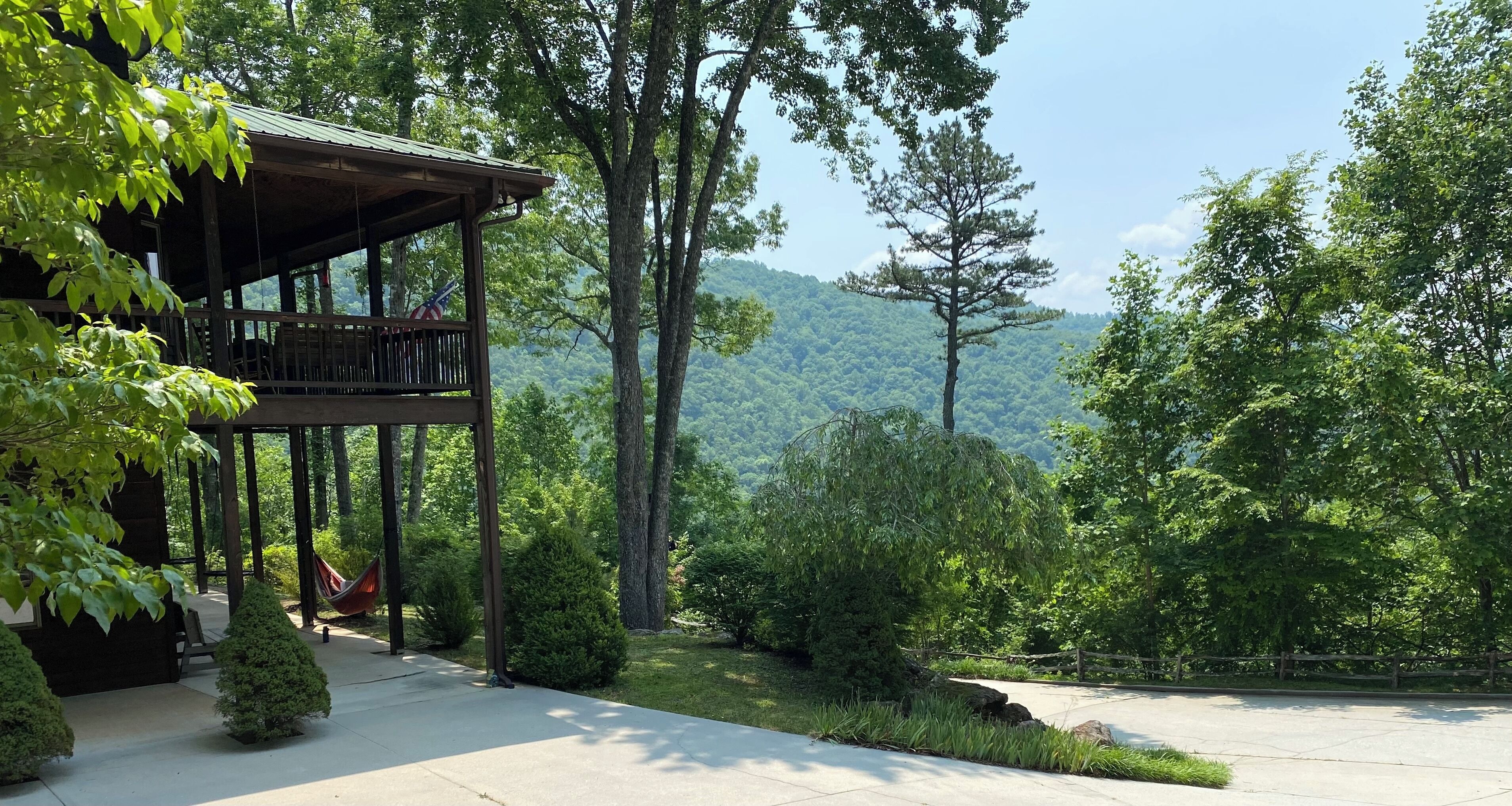 Breathtaking views and a peaceful wraparound porch welcome you to the mountains.