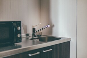 Habitación individual | Escritorio, espacio para trabajar con un portátil, cortinas opacas