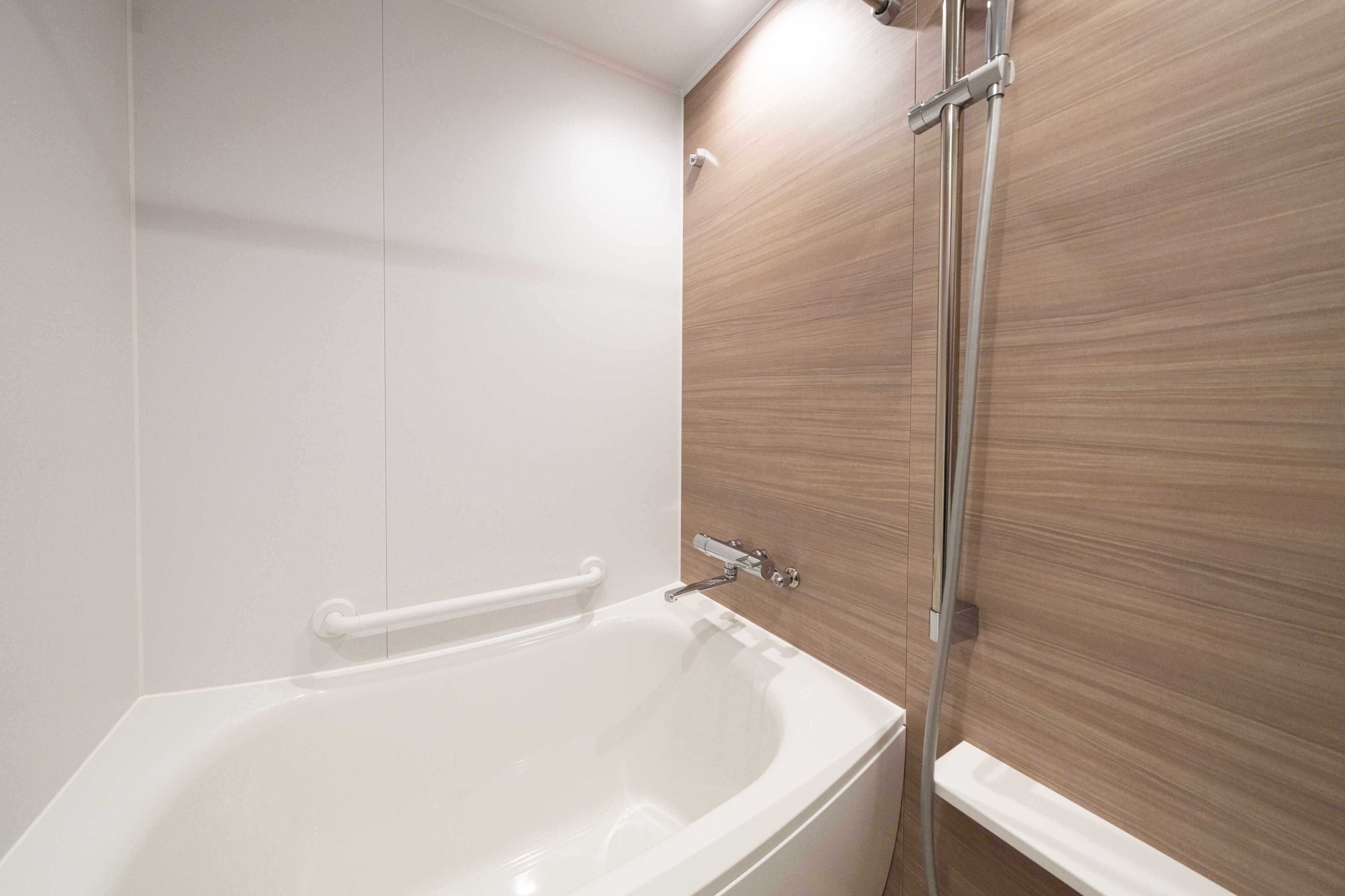 hair dryer, slippers, bidet, towels