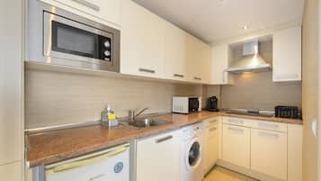 Microwave, toaster, dining tables