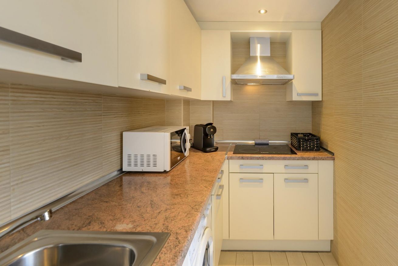 Microwave, toaster, dining tables