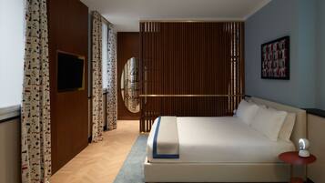 Double Room, Courtyard View | Minibar, in-room safe, individually decorated, individually furnished