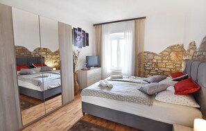 1 chambre, fer et planche à repasser, Wi-Fi gratuit, draps fournis