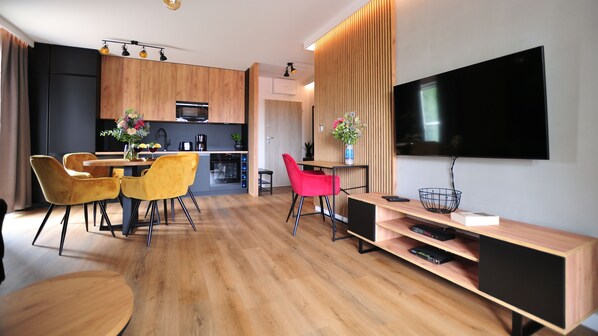 Appartement (24) | Woonkamer | Flatscreentelevisie