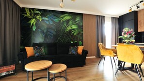 Appartement (24) | Woonkamer | Flatscreentelevisie