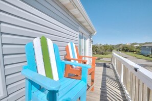 Terrace/patio - Relax at Easy Peasy Ocean Breezy, a cozy oceanfront condo in Oak Island, perfect for 6! (Oak Island)