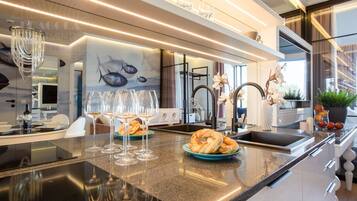 Premium Apartment, 3 Bedrooms, Balcony, River View | Private kitchen | Fridge, stovetop, electric kettle, toaster