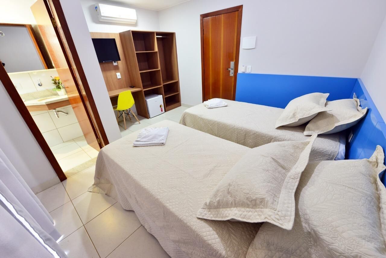 Basic-Zweibettzimmer, 2 Einzelbetten | Minibar, Schreibtisch, kostenloses WLAN, Bettwäsche