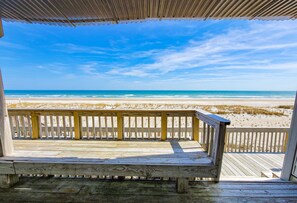 A wooden deck with a view of the beach and ocean. - Queen's Grant E-117 – Perfect Beach Getaway (Topsail Beach)