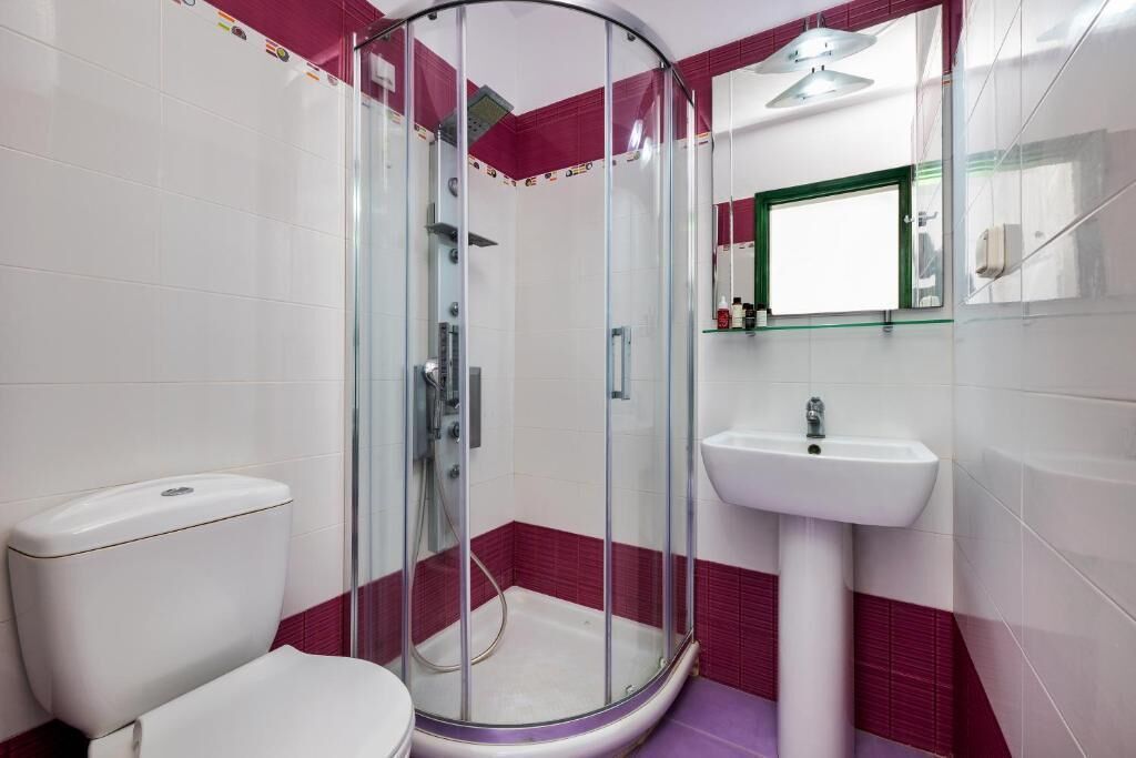 budget room | bathroom | eco-friendly toiletries, hair dryer, dressing gowns, slippers