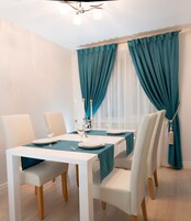 Design Apartment | Living area | 40-inch flat-screen TV with cable channels, TV